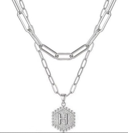 COLLAR LETRA HEX PLATA